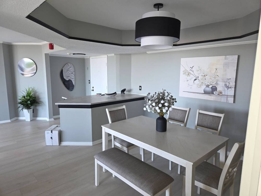 Finished condo dining and kitchen area